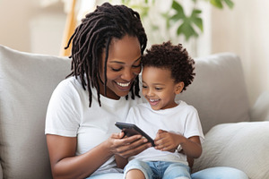 Mother and child enjoying quality, a Photo by Dvoevnore photos