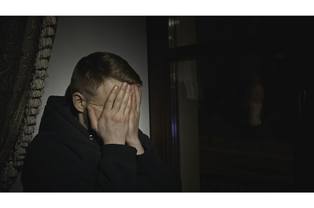 Young man sits tired and looks out, a Person Photo by Media Whale Stock