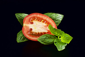a slice of tomato and basil