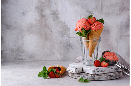 Strawberry ice cream in waffle cone, a Food & Drink Photo by Yulia Furman