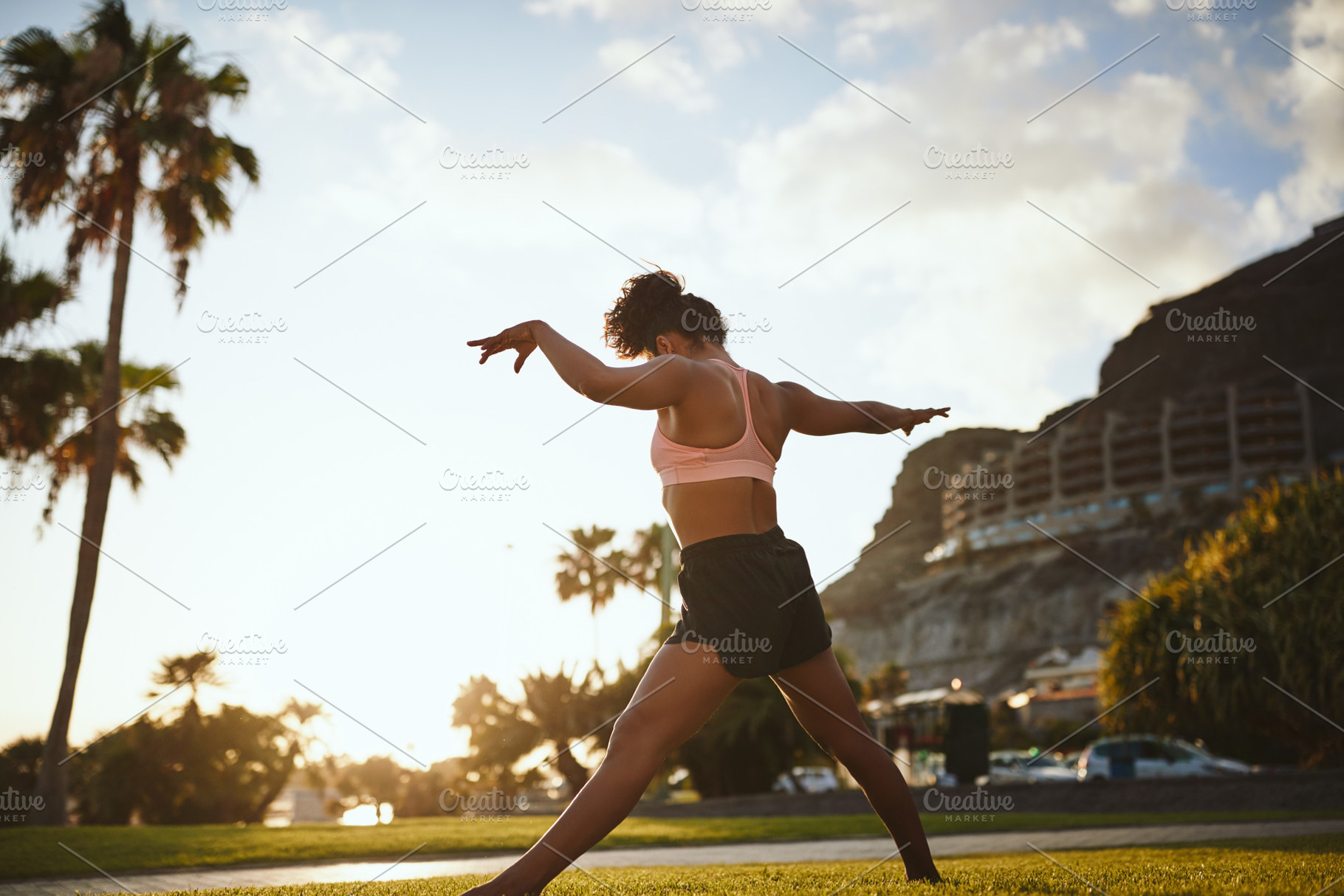 Fit young woman practicing yoga in a city park, a Sports & Recreation Photo by Stefan & Janni