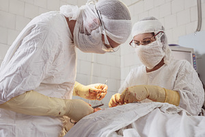 The surgeon makes an operation.
