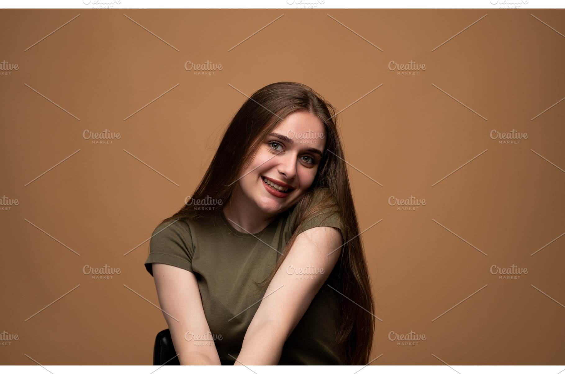 Young brunette woman with long hair, a Person Photo by volodymyrshtun13795