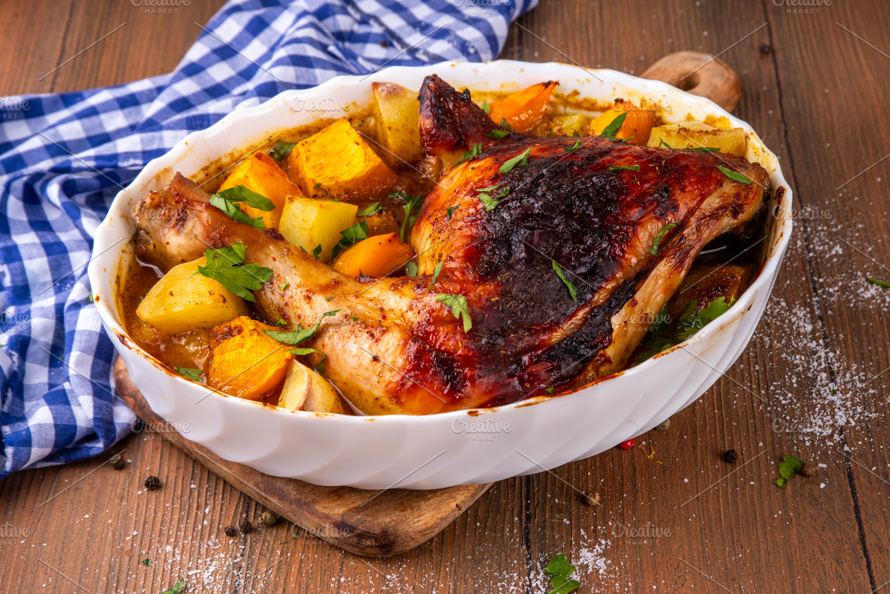 Roasted baked chicken quarter with pumpkin and potato stew, a Food & Drink Photo by Rimma