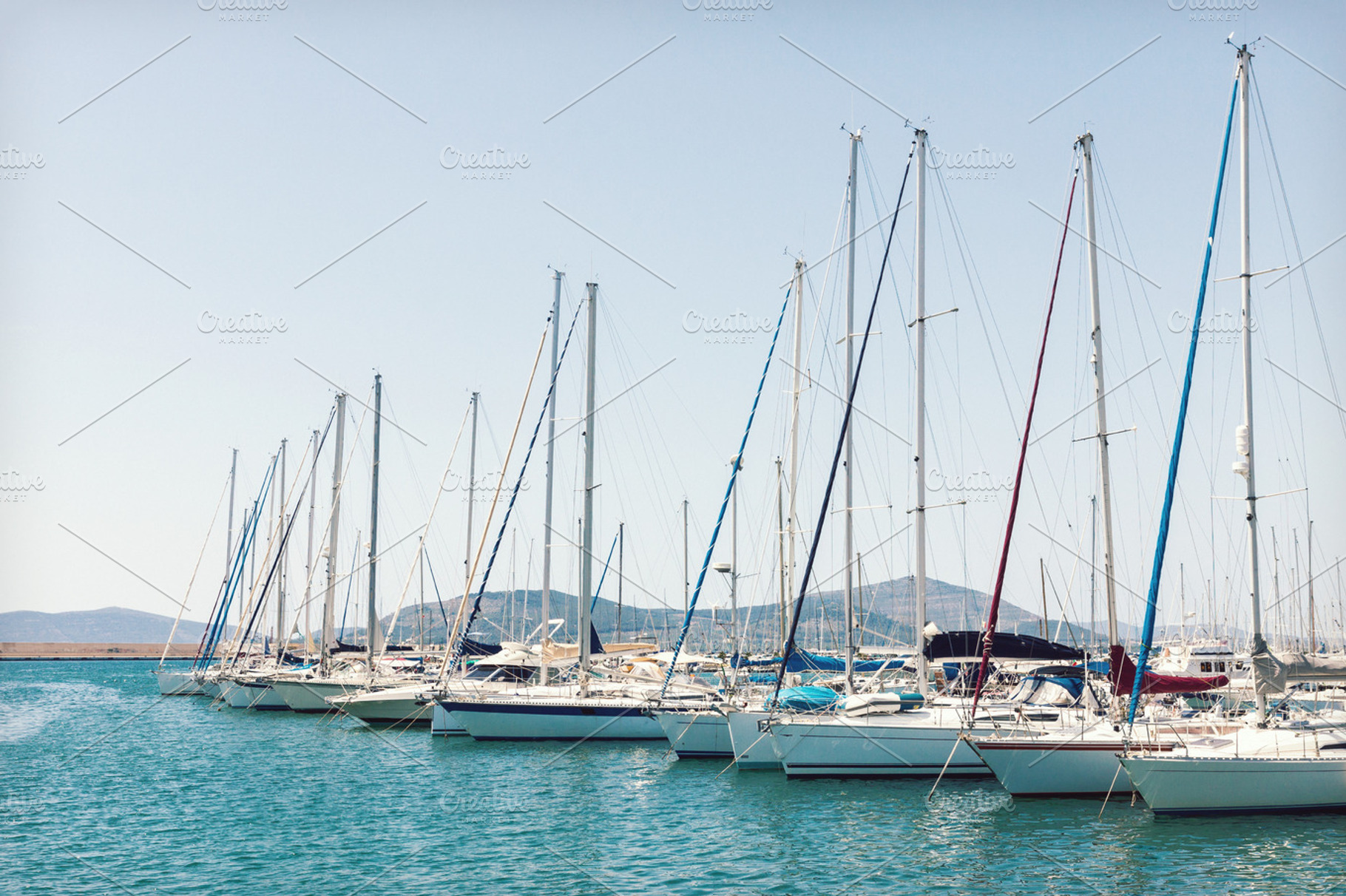 Sailing boats moored in the harbor, a Transportation Photo by BOOCYS