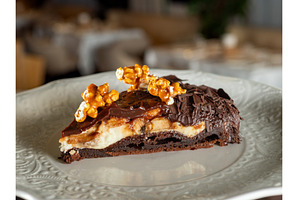 Snikers cake with peanut and caramel, a Food & Drink Photo by Fascinadora