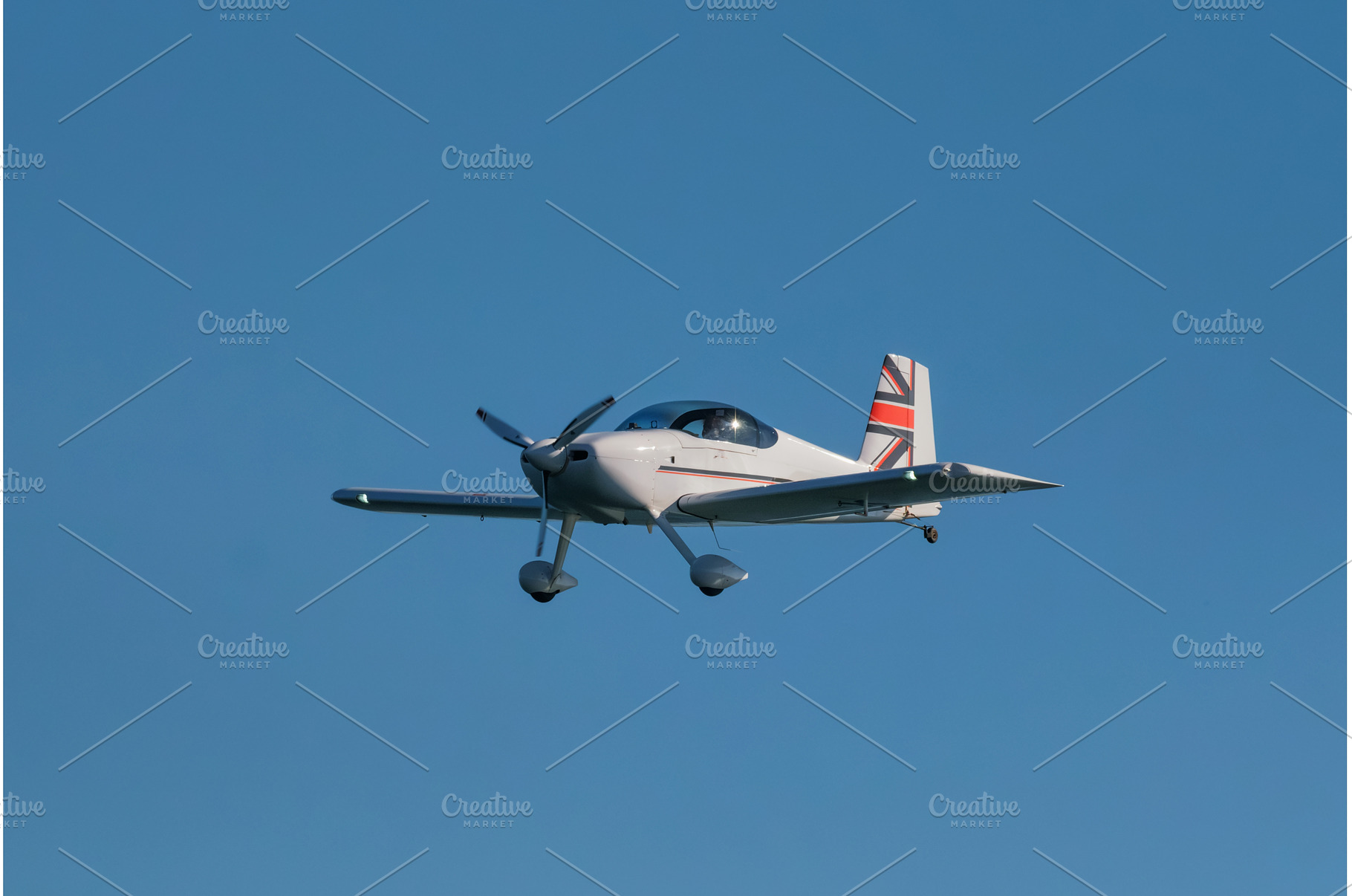 Stunt aerobatic plane performing, a Nature Photo by f9photos