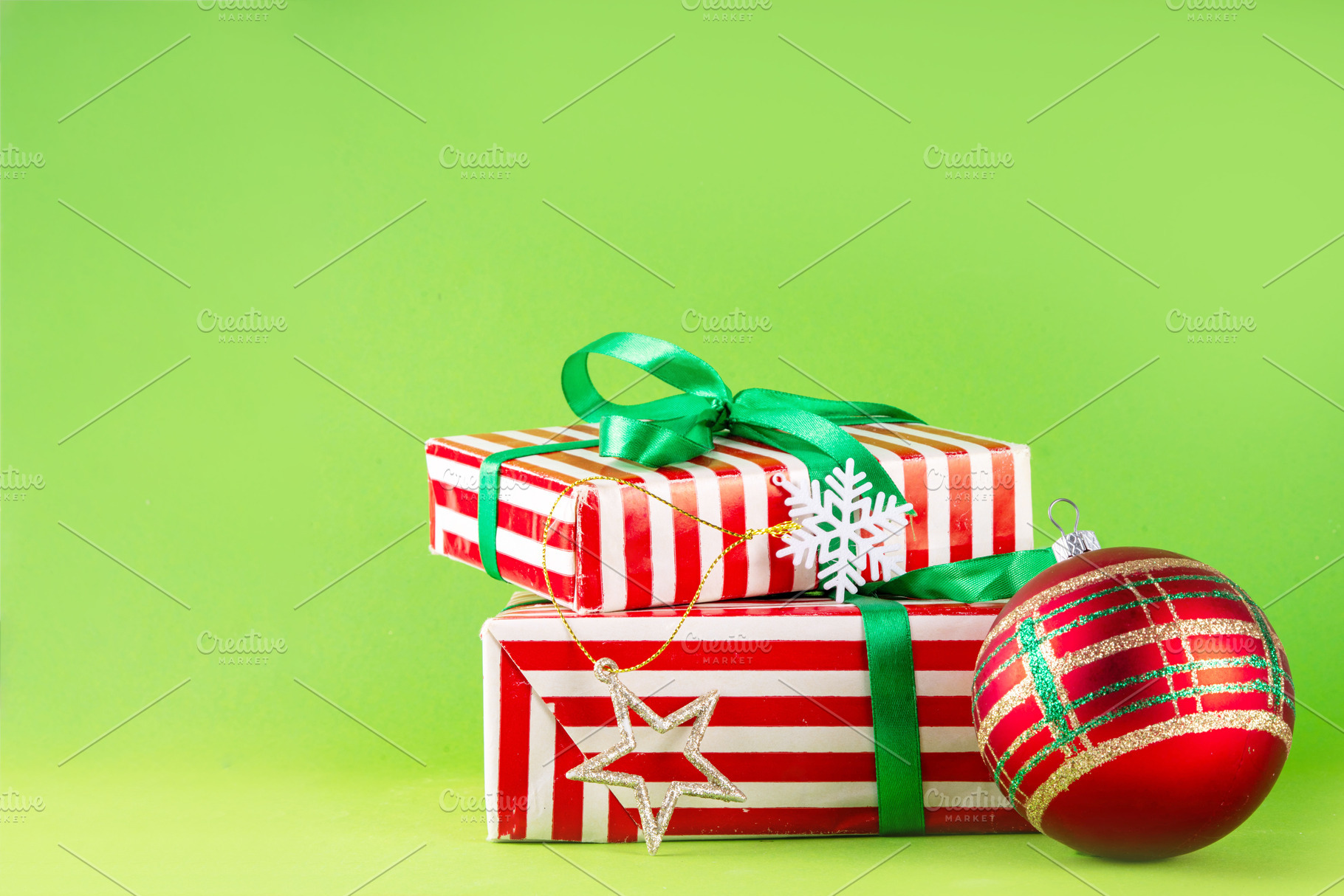 Bright high-colored background with Christmas boxes, festive bau, a Holiday Photo by Rimma