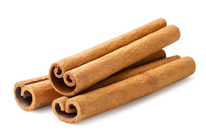 Three cinnamon sticks close-up on a, a Food & Drink Photo by innakreativ