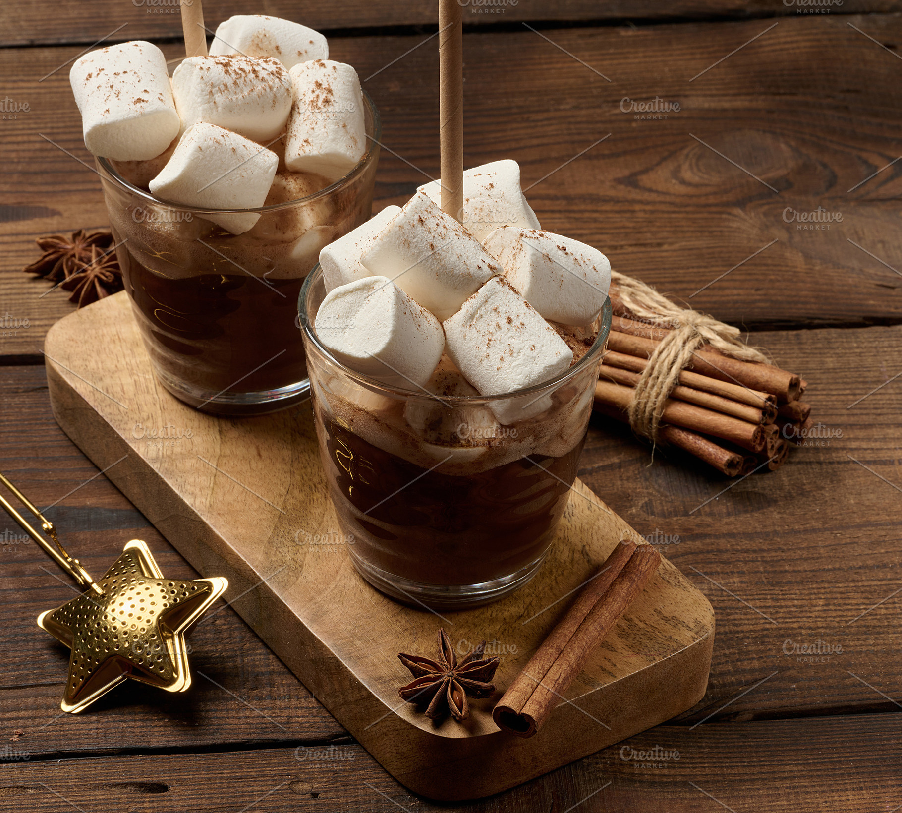 Two glasses of hot chocolate with fluffy marshmallows and a stra, a Food & Drink Photo by ndanko