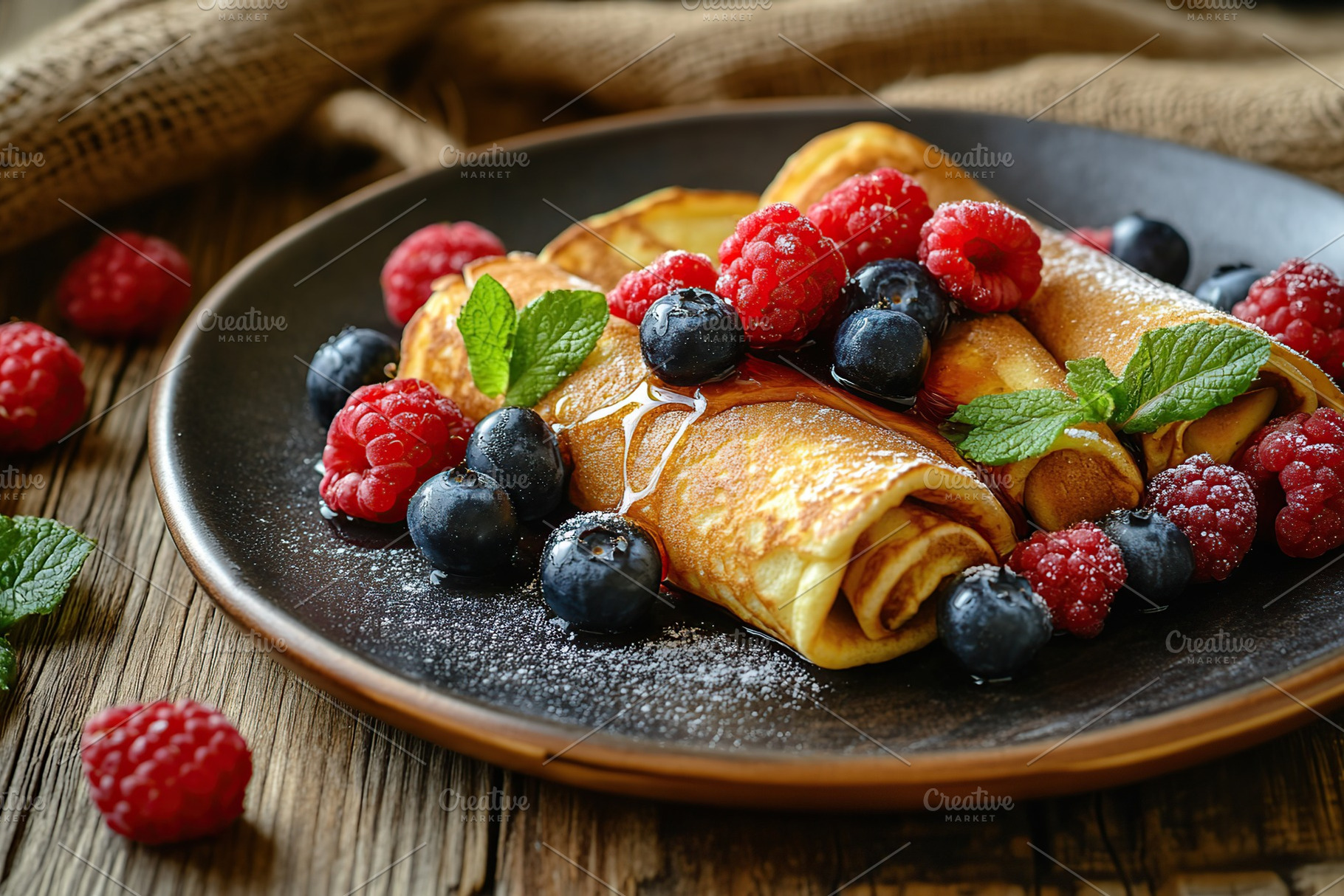 Fluffy pancakes topped with ripe berries and sweet syrup for a delightful break, a Food & Drink Photo by AlyaAnd