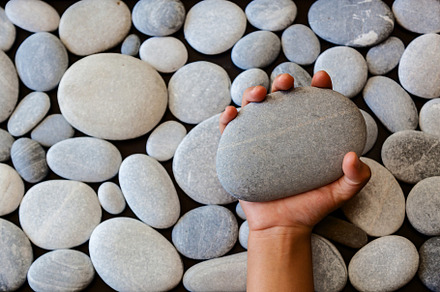 background of round stones, an Abstract Photo by Photostock