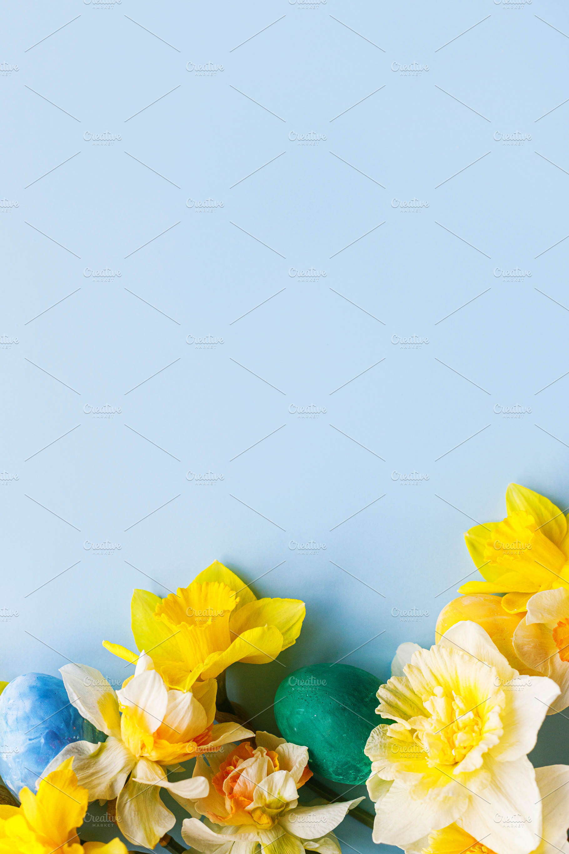 Happy Easter! Colorful Easter eggs with daffodils flowers flat l, a Holiday Photo by Sonjachni