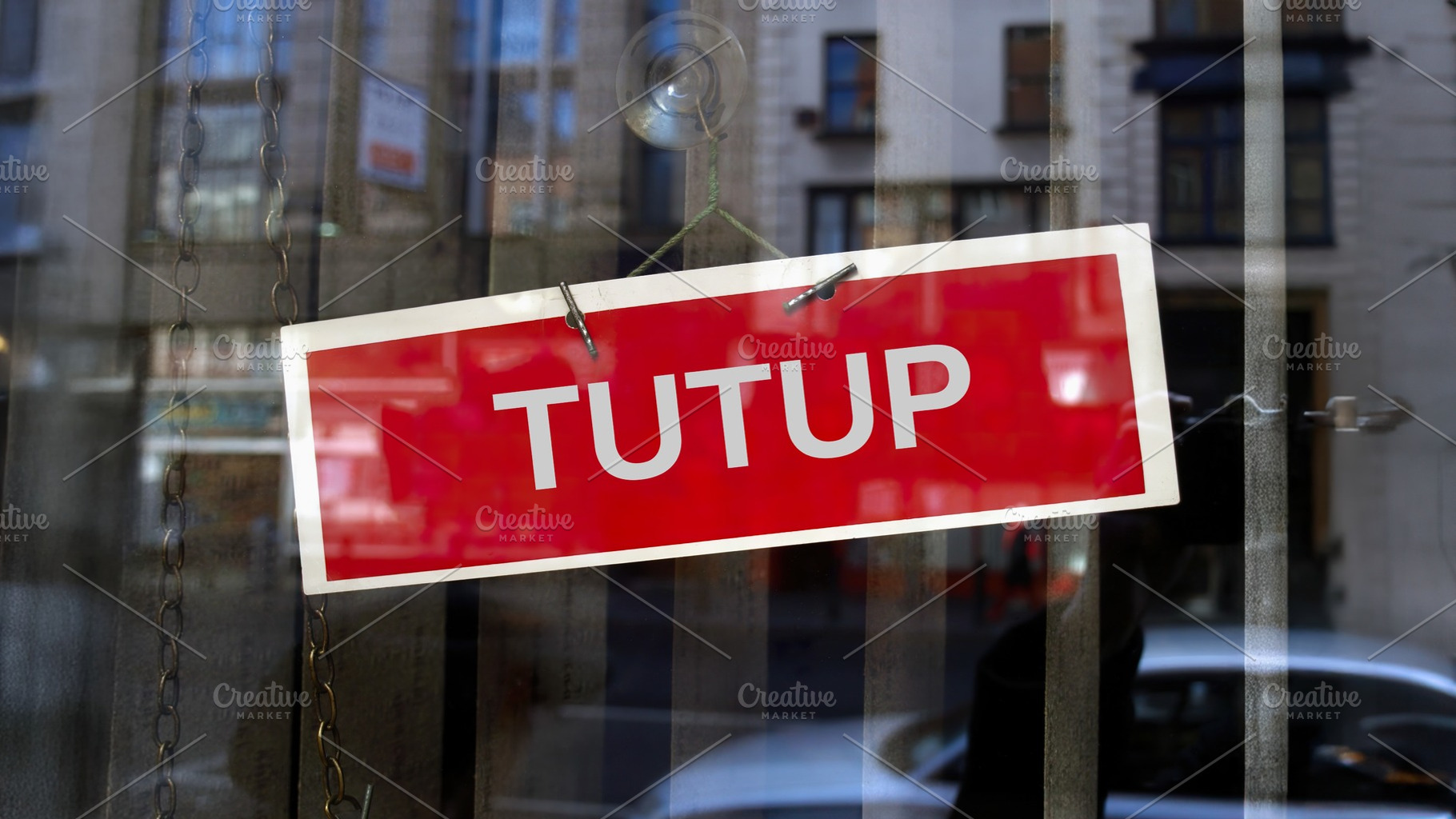 closed sign in Indonesian, a Photo by WorldOfPhotos
