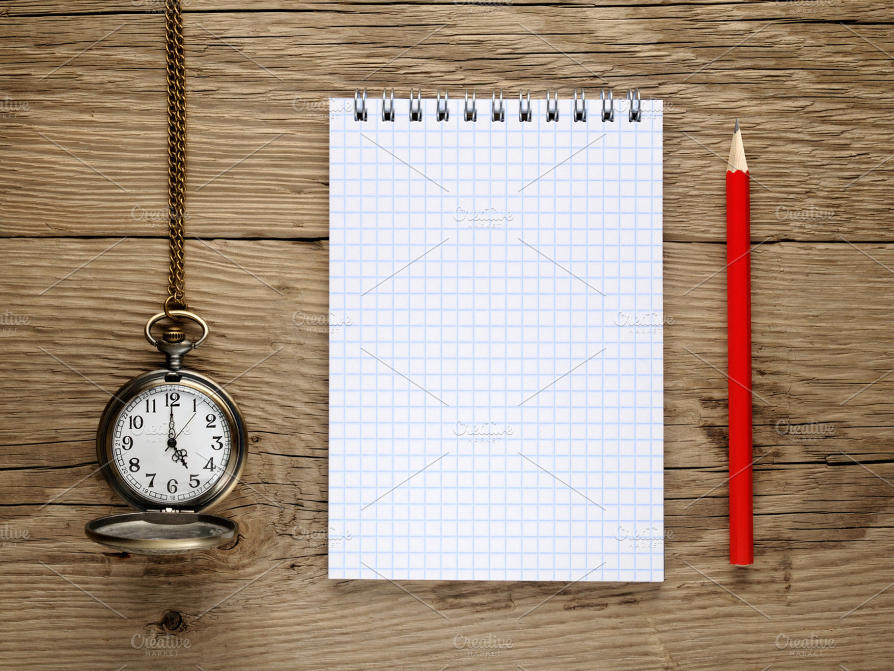 Pocket watch, pencil and note book