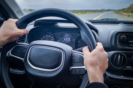 Inside car person driving at high speed velocity, a Transportation Photo by DanFLCreativo