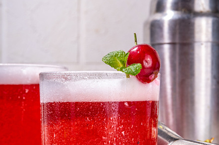 Cherry and lime alcoholic booze cocktail, a Food & Drink Photo by Rimma