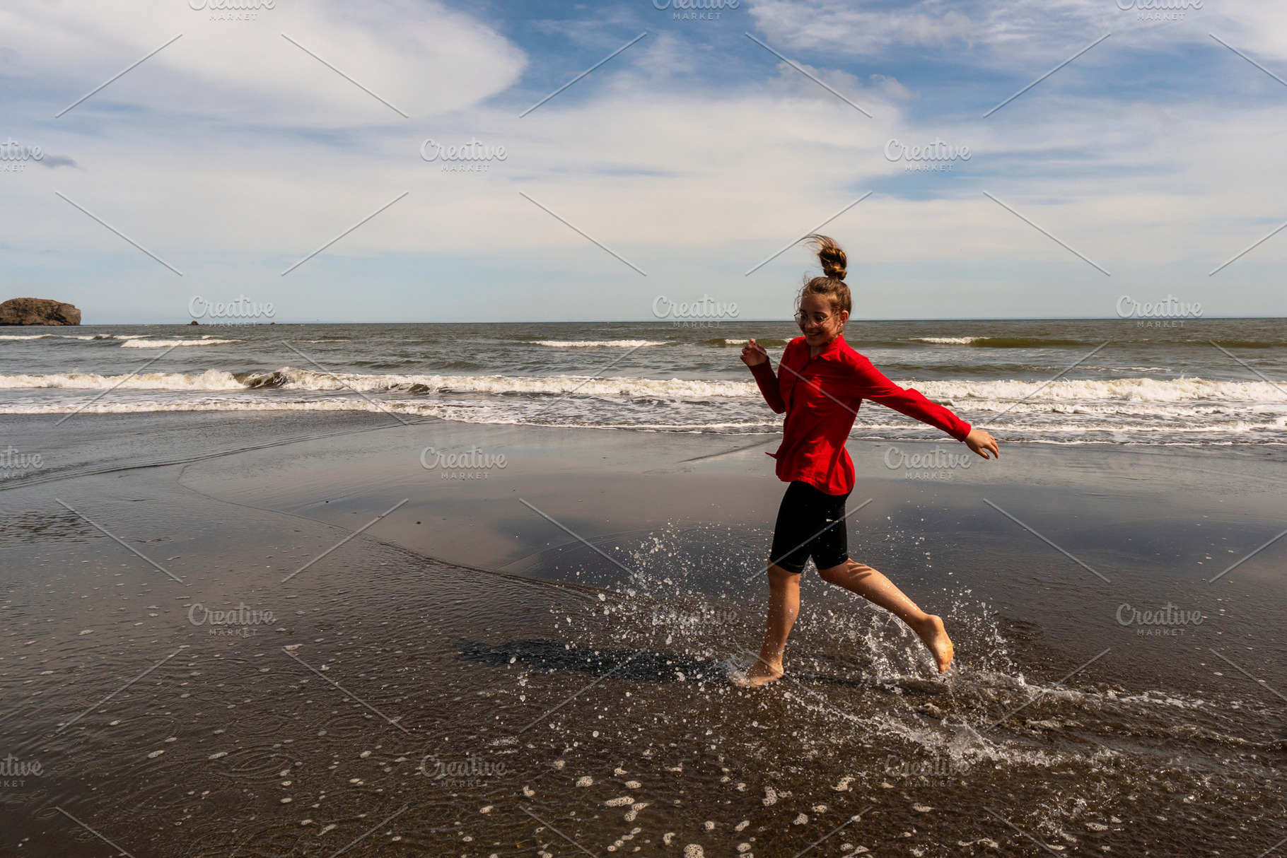 Girl playfully running, a Person Photo by Elena Vagengeim