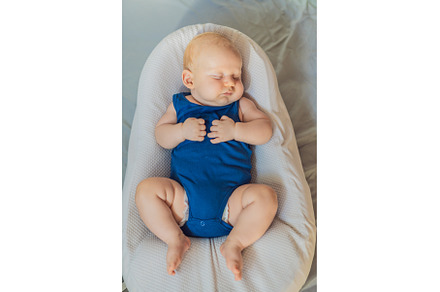 Chubby 3-month-old baby peacefully
