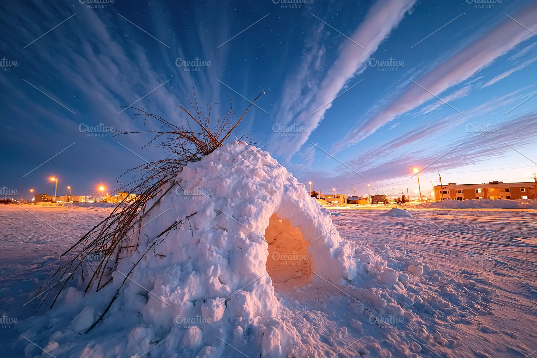 Snow structure under a starry sky with colorful clouds at dusk in a winter land, a Photo by AlyaAnd