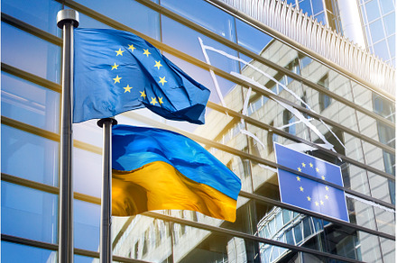 Flags of European Union and Ukraine, a Business Photo by Yaroslav Danylchenko
