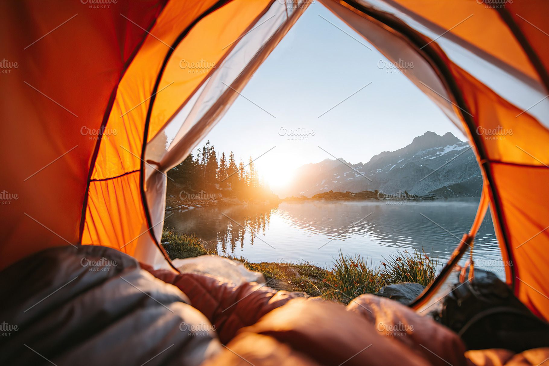 Opening tent door reveals stunning lake view at sunrise in mountainous wilderne, a Photo by AlyaAnd