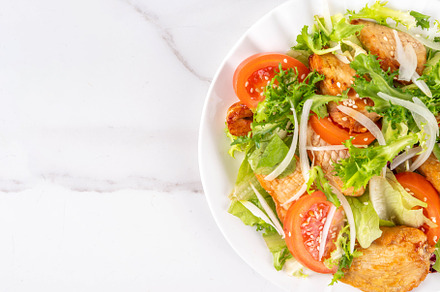 Vegetable salad with grilled chicken, a Food & Drink Photo by Rimma