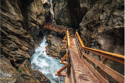 Wooden hike trail path inside a, an Architecture Photo by Igor Tichonow