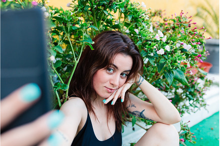 Photo of adorable young woman making, a Person Photo by Manu Reyes