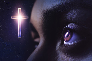 Eye looking at a the cross