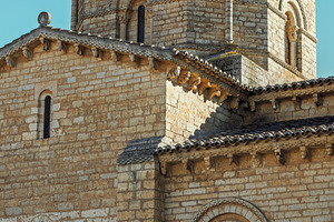Apse and tower of a Romanesque stone, an Architecture Photo by Perpis