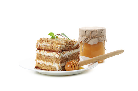 Concept of sweets, honey cake, isolated on white background, a Food & Drink Photo by AtlasStudio