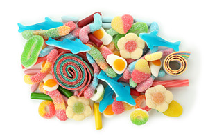 Gummy candies isolated on white background, top view, a Food & Drink Photo by AtlasStudio PRO