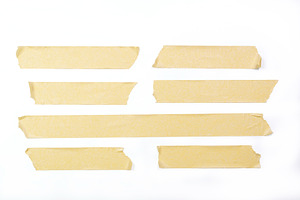 Adhesive tape pieces in line, a Background Photo by wr7 Media