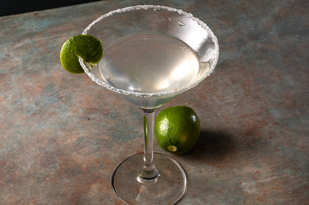 Margarita cocktail with lime in a salted rimmed glass on earthy, a Food & Drink Photo by SZ IMAGE