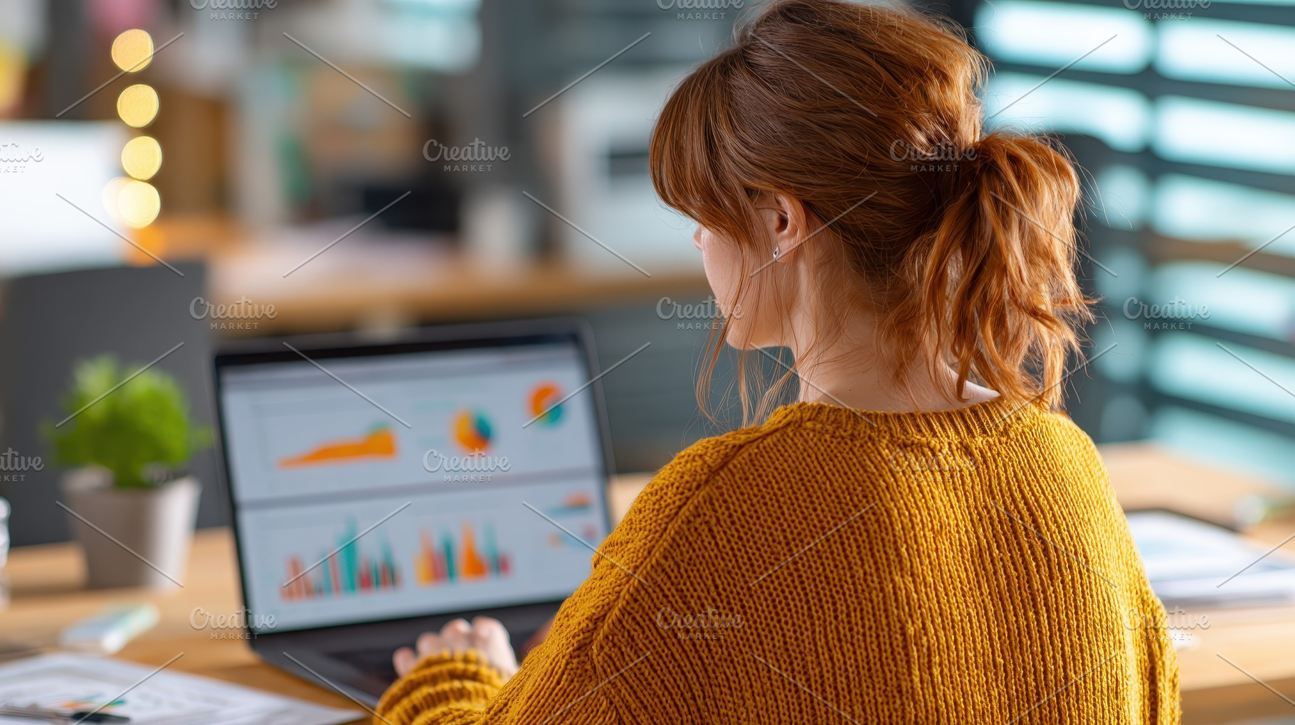 Woman working on laptop analyzing da, a Photo by Pixeness Studio