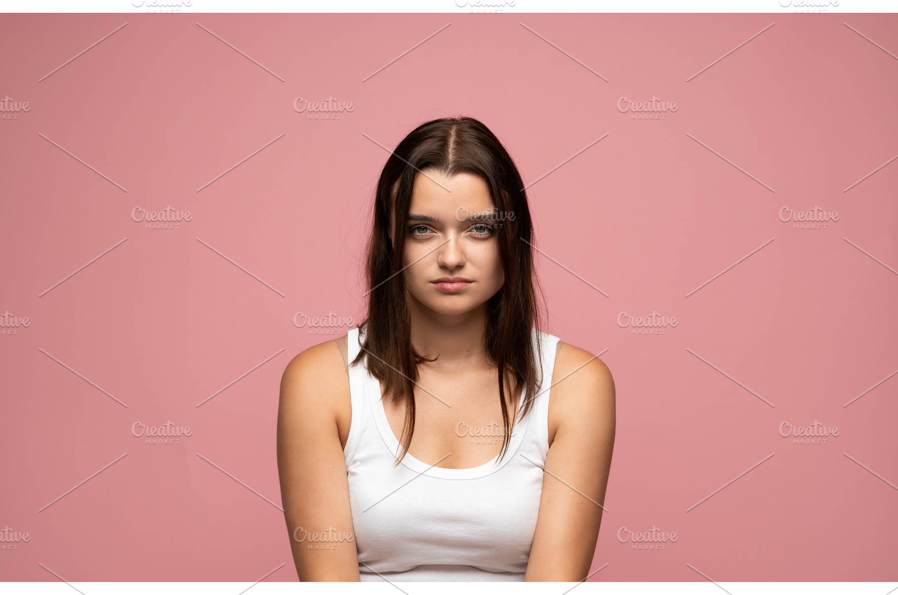 Young woman with serious expression, a Person Photo by volodymyrshtun13795