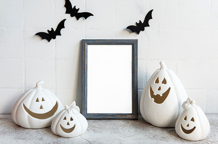 Mock up  frame with Jack o Lantern and pumpkin decor on a table., a Holiday Photo by Olena Rudo