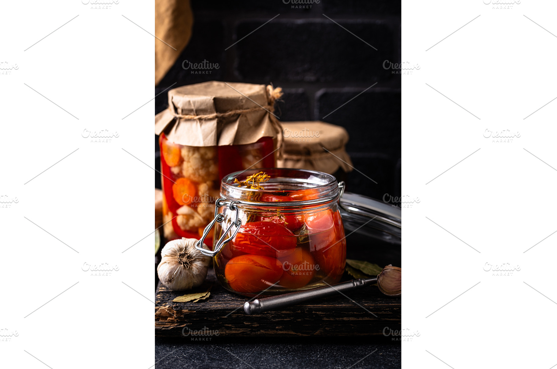 Marinated pickled tomatoes in jar, a Food & Drink Photo by Yulia Furman