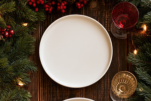 Elegant Christmas dinner table setting with festive decorations