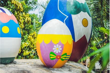 Multicolored eggs in the grass, a Holiday Photo by Elizaveta Galitskaya
