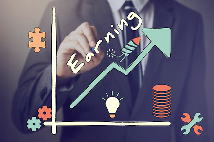 Businessman drawing a graph of increasing earning, a Business Photo by Twinster Photo