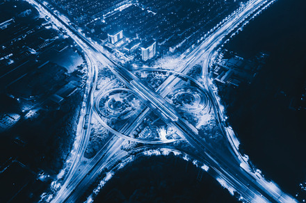 Aerial view of highway junctions wit containing night, city, and cityscape, an Architecture Photo by Tampatra