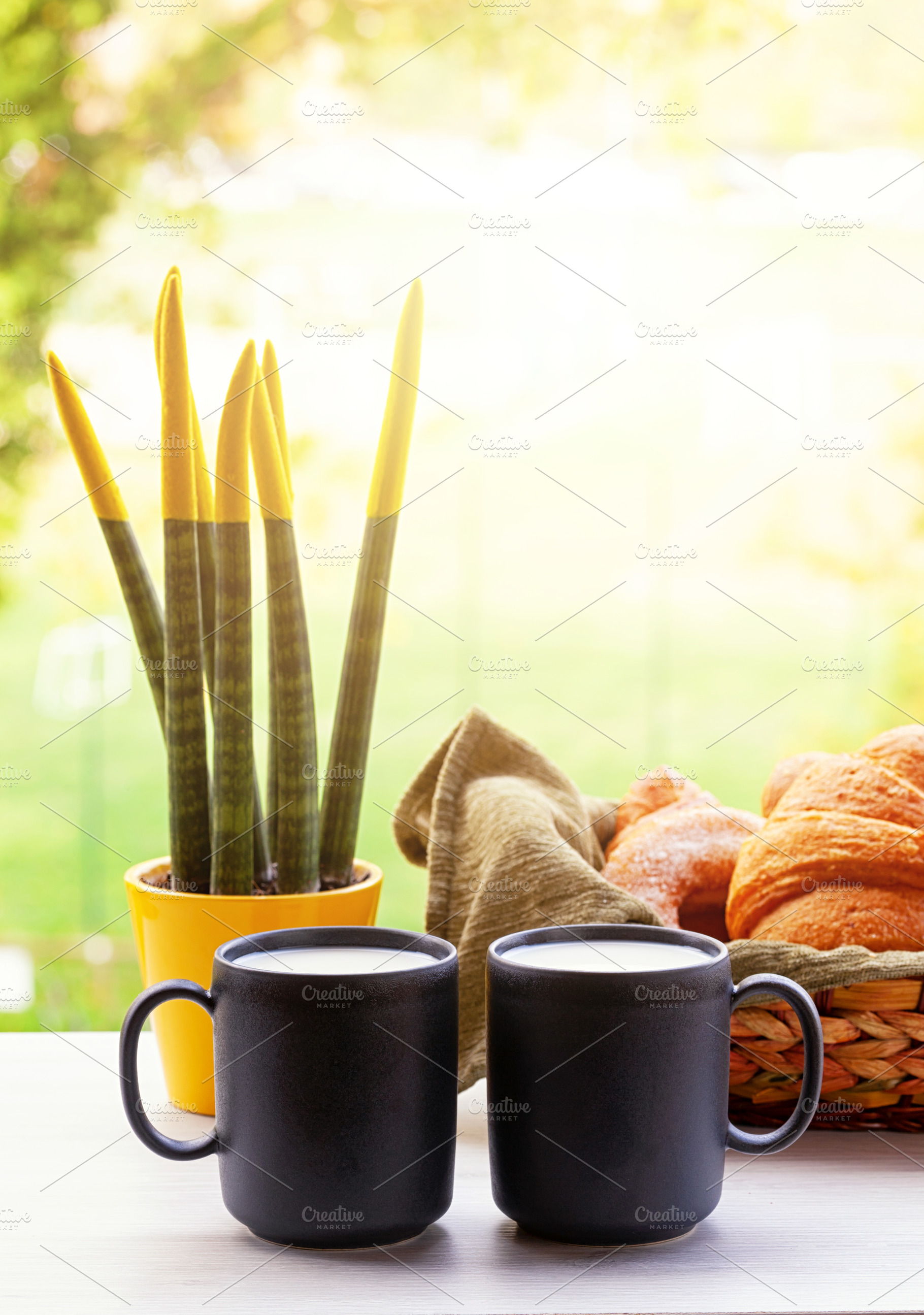 Enjoying a Delicious Breakfast with Milk and Croissants in the Morning Sun, a Food & Drink Photo by Antonio Gravante Market