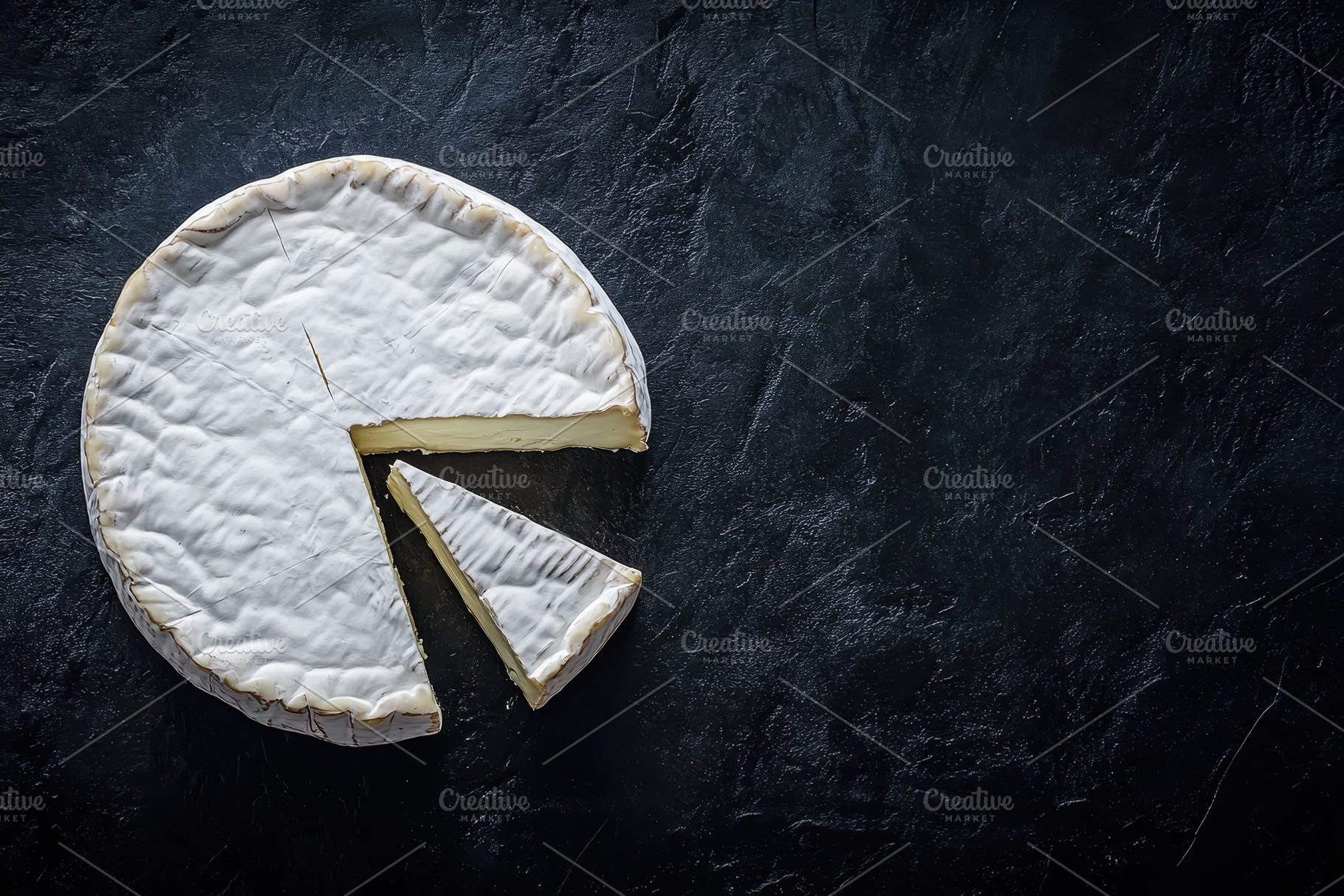 Soft cheese wheel with a slice cut o, a Photo by Iftikhar Alam