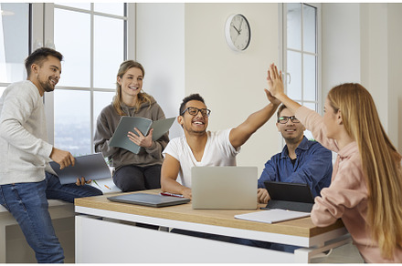 Cheerful multiracial students give, a School & Education Photo by StudioRomantic