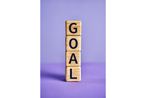 The word GOAL on wooden blocks over, a Business Photo by Gladkov photography