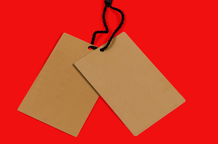 Empty brown cardboard tag with  string, a Background Photo by vimart