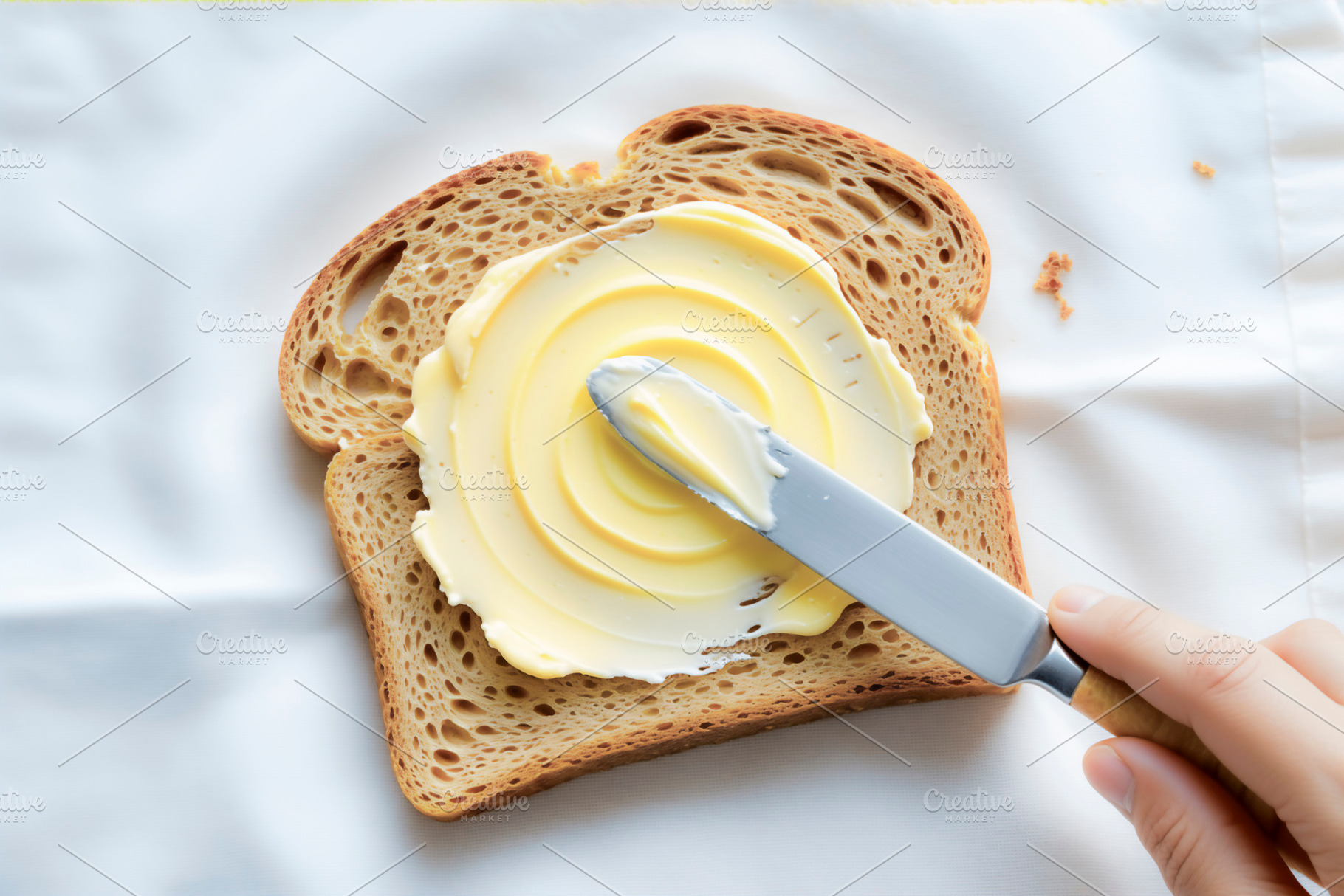Spreading creamy butter, a Photo by rarrarorro