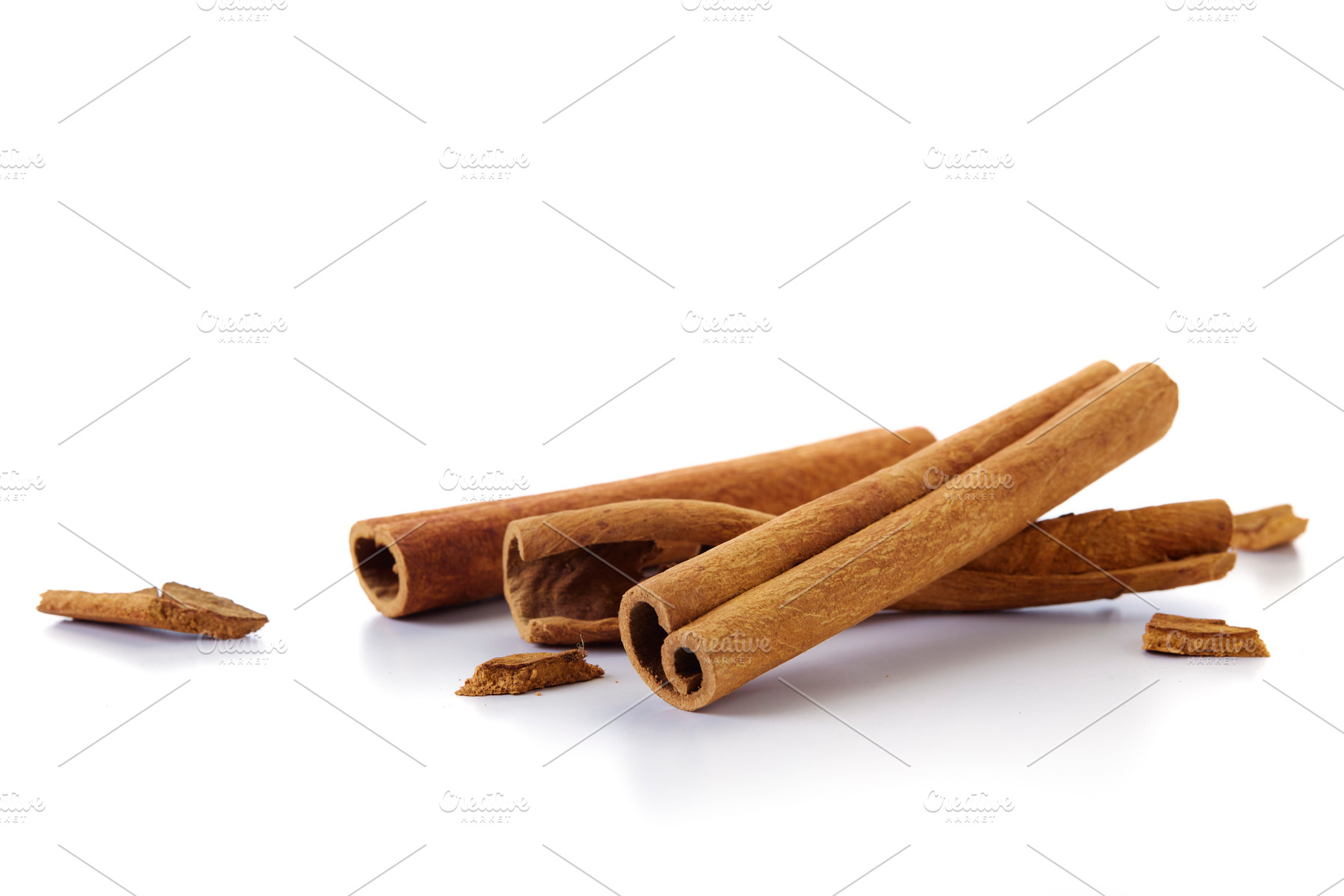 cinnamon sticks on white, a Background Photo by 1981 Rustic studio kan
